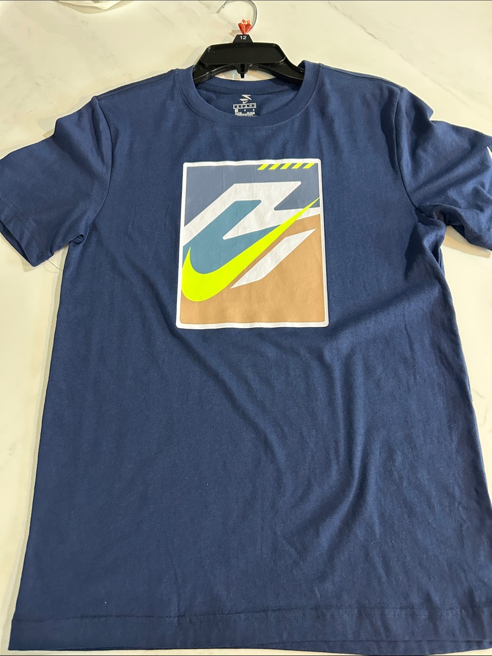 Nike boysNavy Blue Graphic Swoosh T-Shirt with Neon Accent